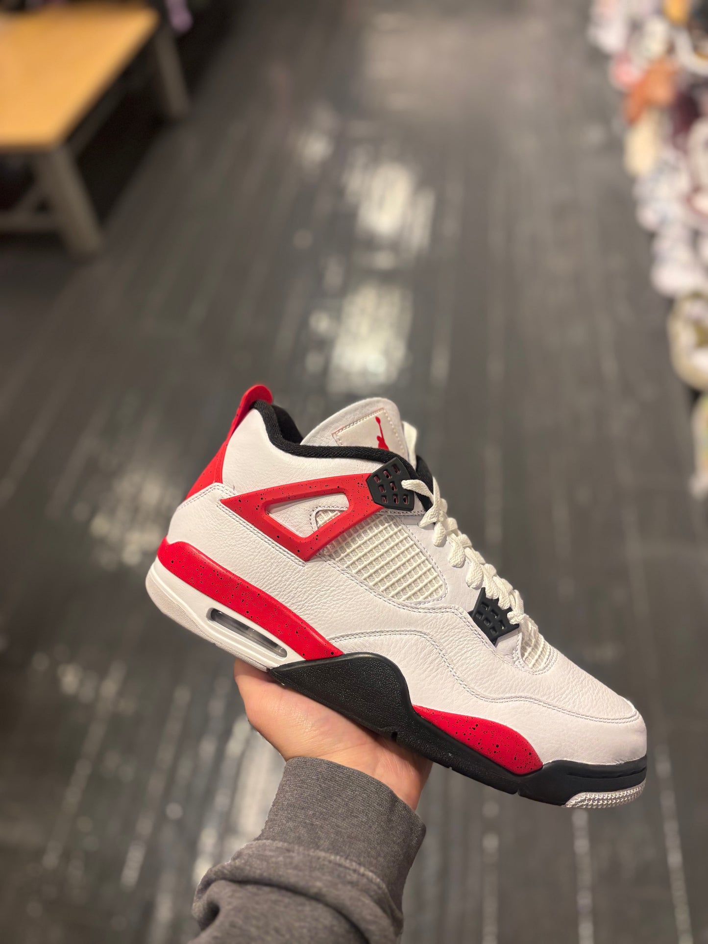 Jordan 4 “red cement”