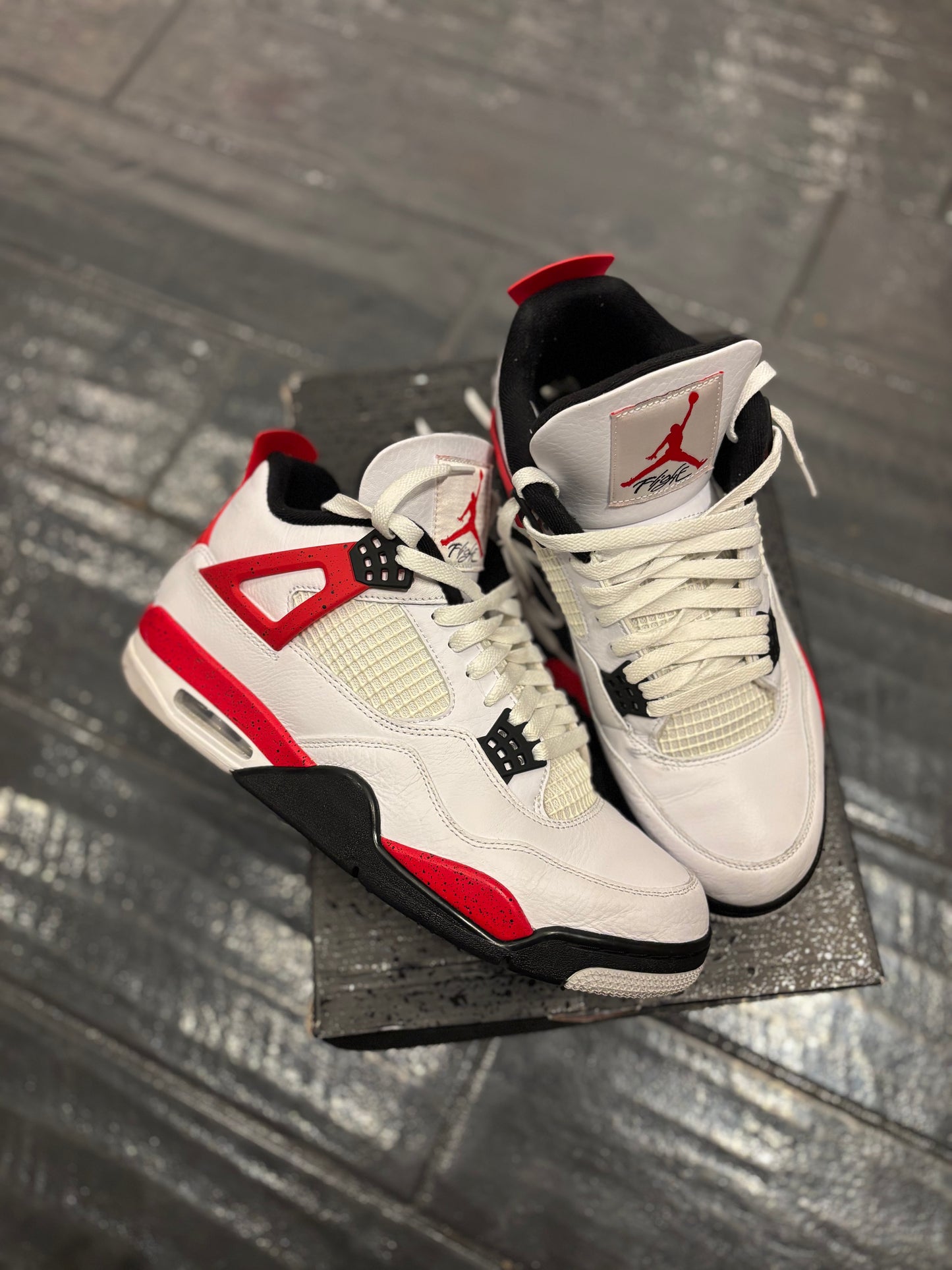 Jordan 4 “red cement “